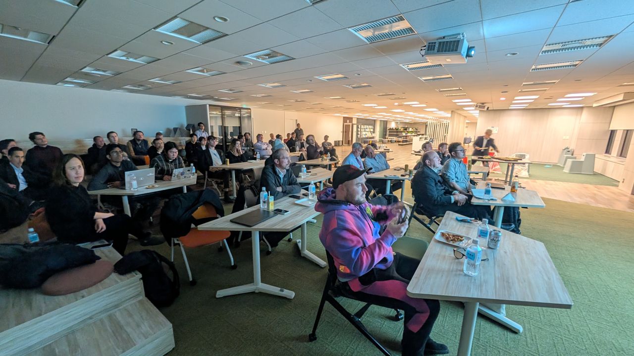 Members seated in conversation at a Japan Angels event
